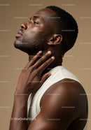 Close-up of African Man Applying Moisturizer Skincare Routine