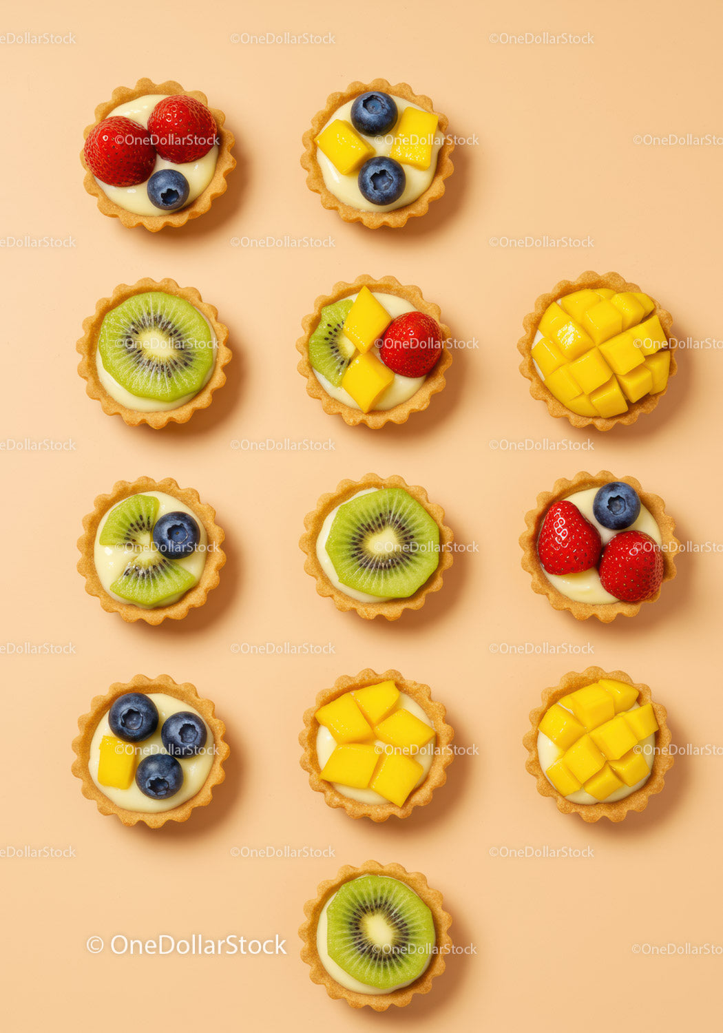 Assorted Mini Fruit Tarts with Cream and Fresh Fruit