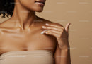 Close-up of a Woman Applying Moisturizer on Her Shoulder for Healthy Skin