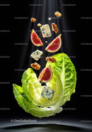 Fresh lettuce with figs blue cheese and walnuts floating