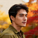 Thoughtful man enjoying serene autumn outdoors