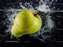 Yellow Pear Splashing in Water on Black Background