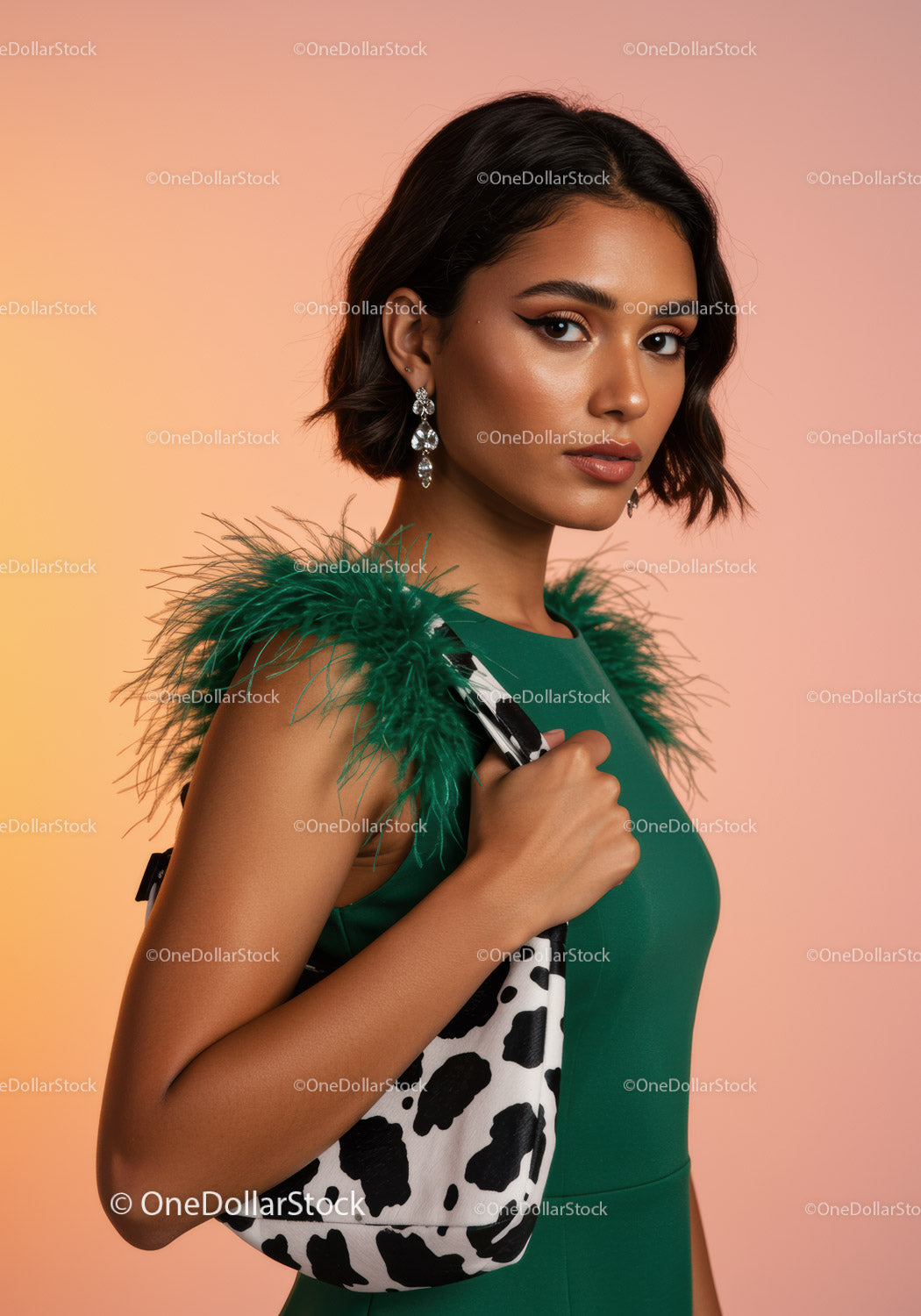 Elegant Woman in Green Dress with Feathery Details and Dazzling Jewelry