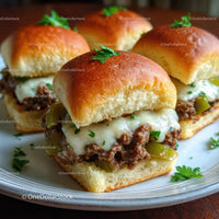 Gourmet Beef Sliders with Cheese and Pickles on Fresh Buns