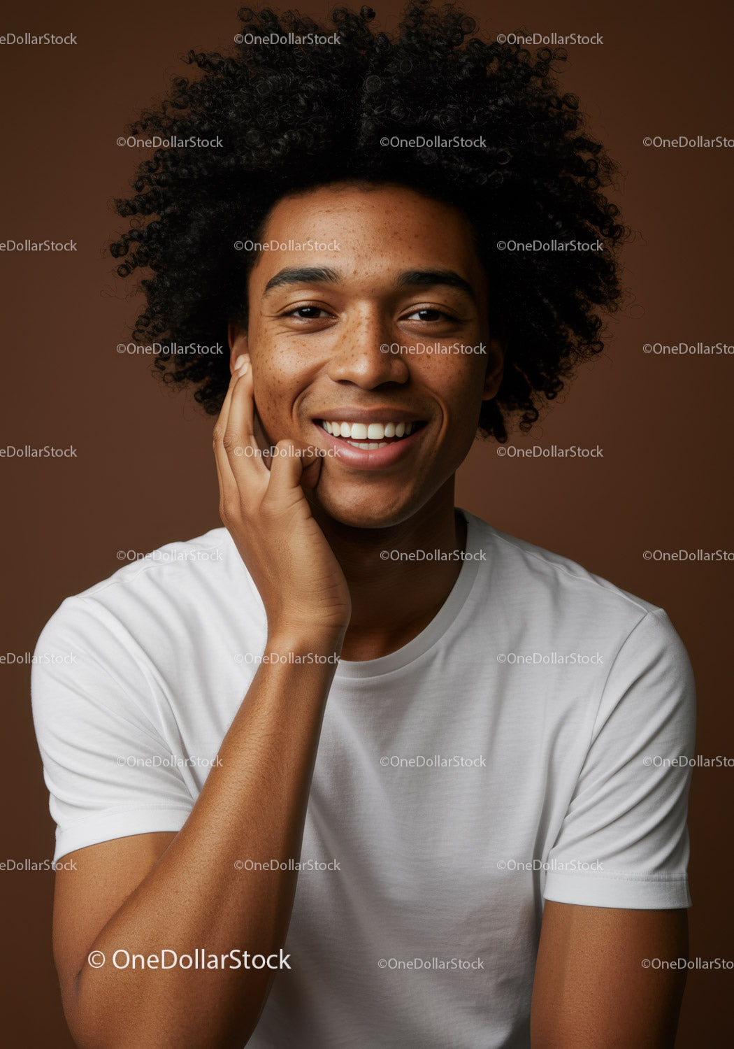 Happy Young Man Portrait With Curly Hair and Warm Brown Background
