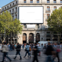 Crowded urban square with historic building and blank billboard