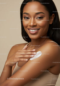 Beautiful Black Woman Applying Lotion on Shoulder Skin Care Concept