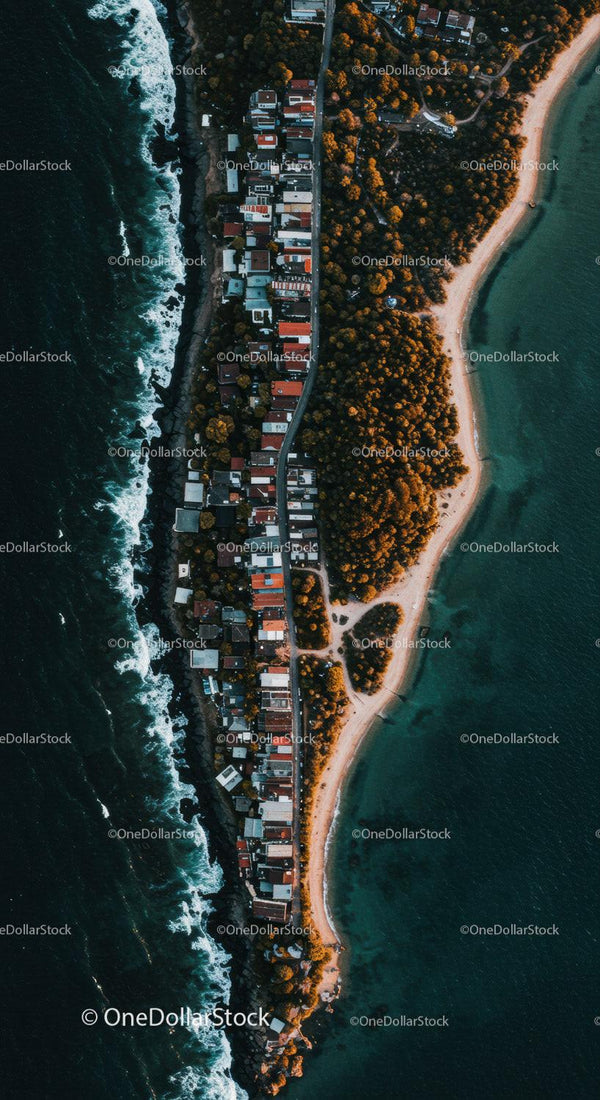 Colorful Coastal Village with Beach and Ocean Aerial View