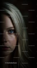 Close up portrait of young woman with striking blue eye