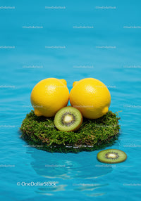 Fresh lemons and kiwi slices on moss in blue water
