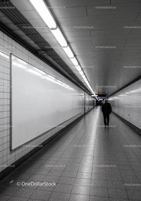 Empty Subway Tunnel Corridor with Man Walking in Business Suit
