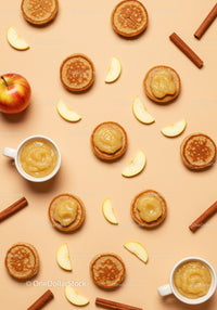 Mini pancakes with applesauce and cinnamon sticks