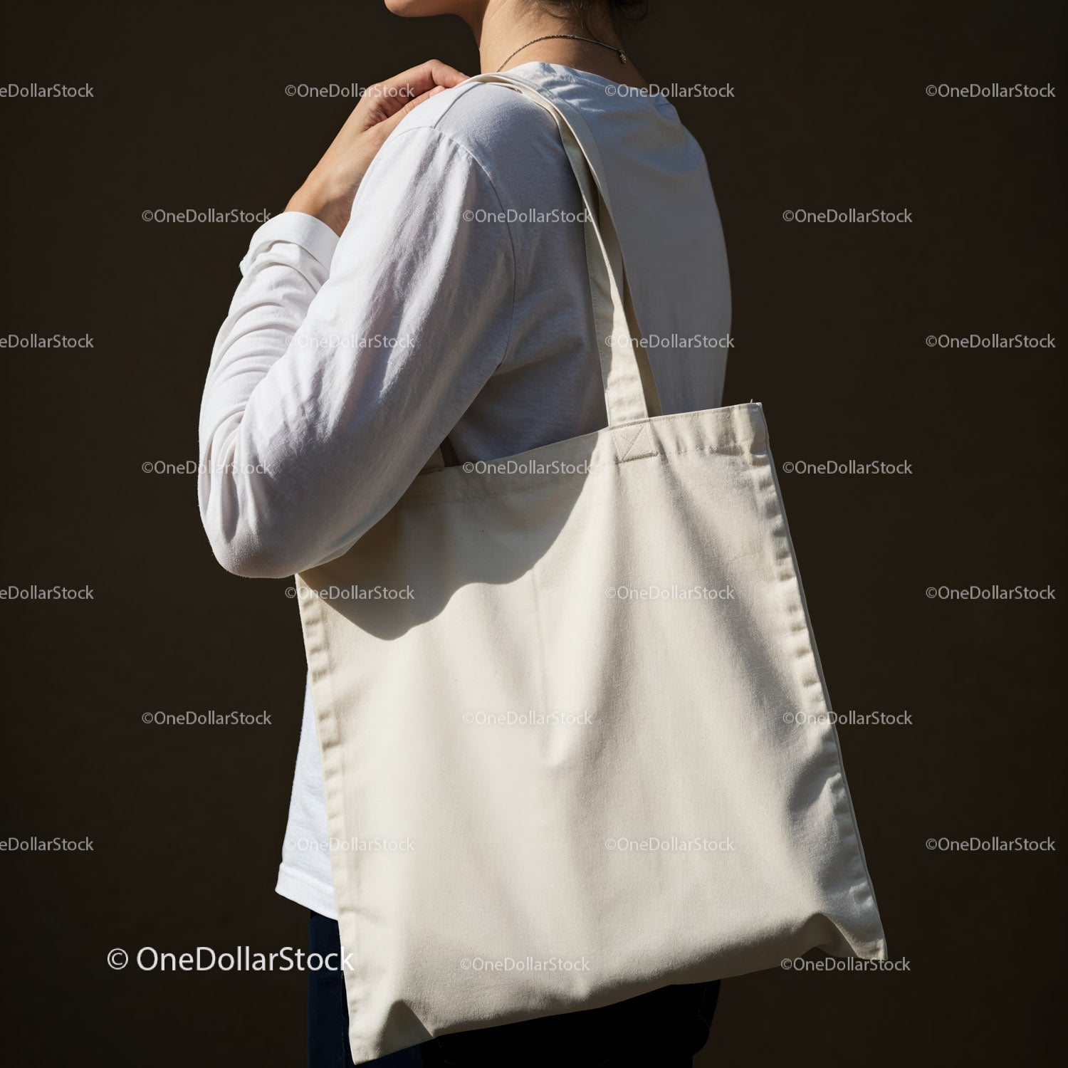 Person Holding Large Beige Canvas Tote Bag