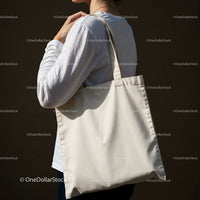 Person Holding Large Beige Canvas Tote Bag