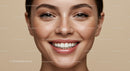 Closeup of radiant woman smiling with natural freckles