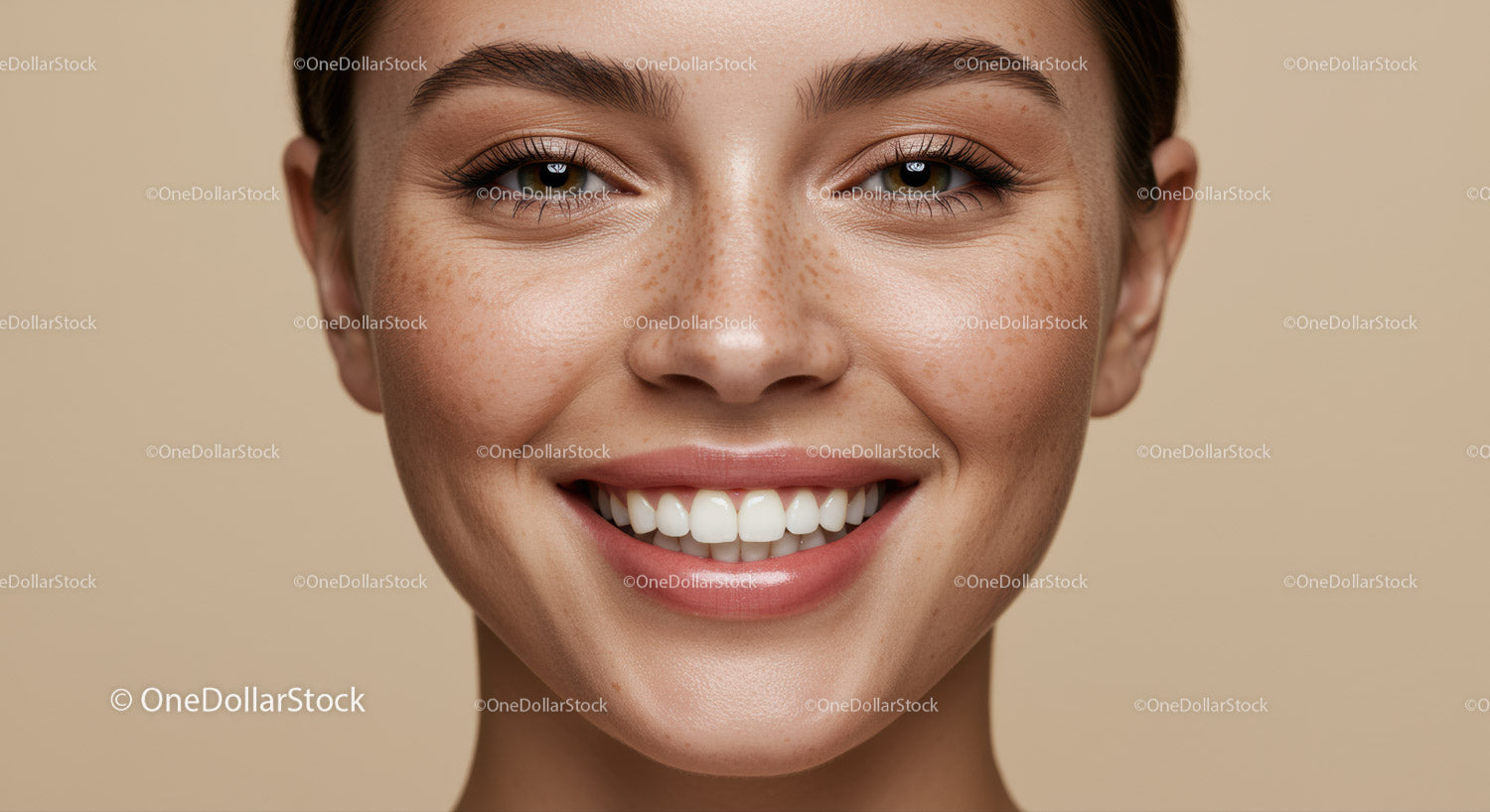 Closeup of radiant woman smiling with natural freckles