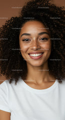 Portrait of a Smiling Woman with Curly Hair and Freckles