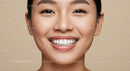 Close up of smiling woman with flawless natural skin