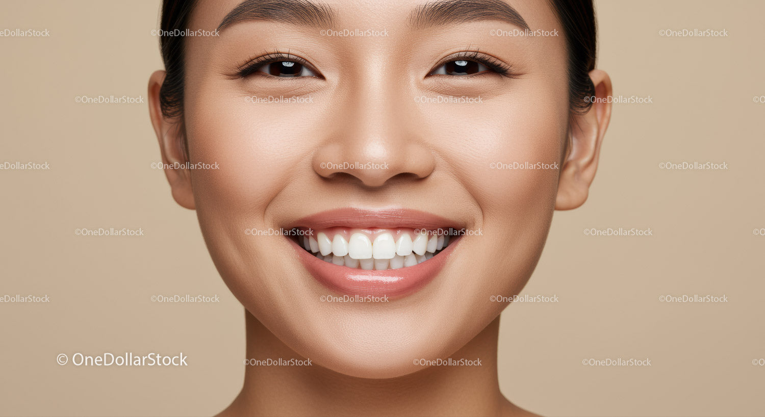 Close up of smiling woman with flawless natural skin