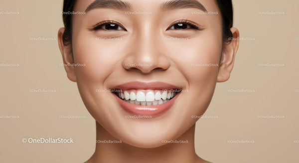 Close up of smiling woman with flawless natural skin