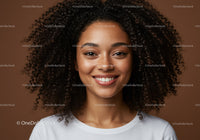 Smiling Woman with Curly Hair and Natural Beauty Portrait