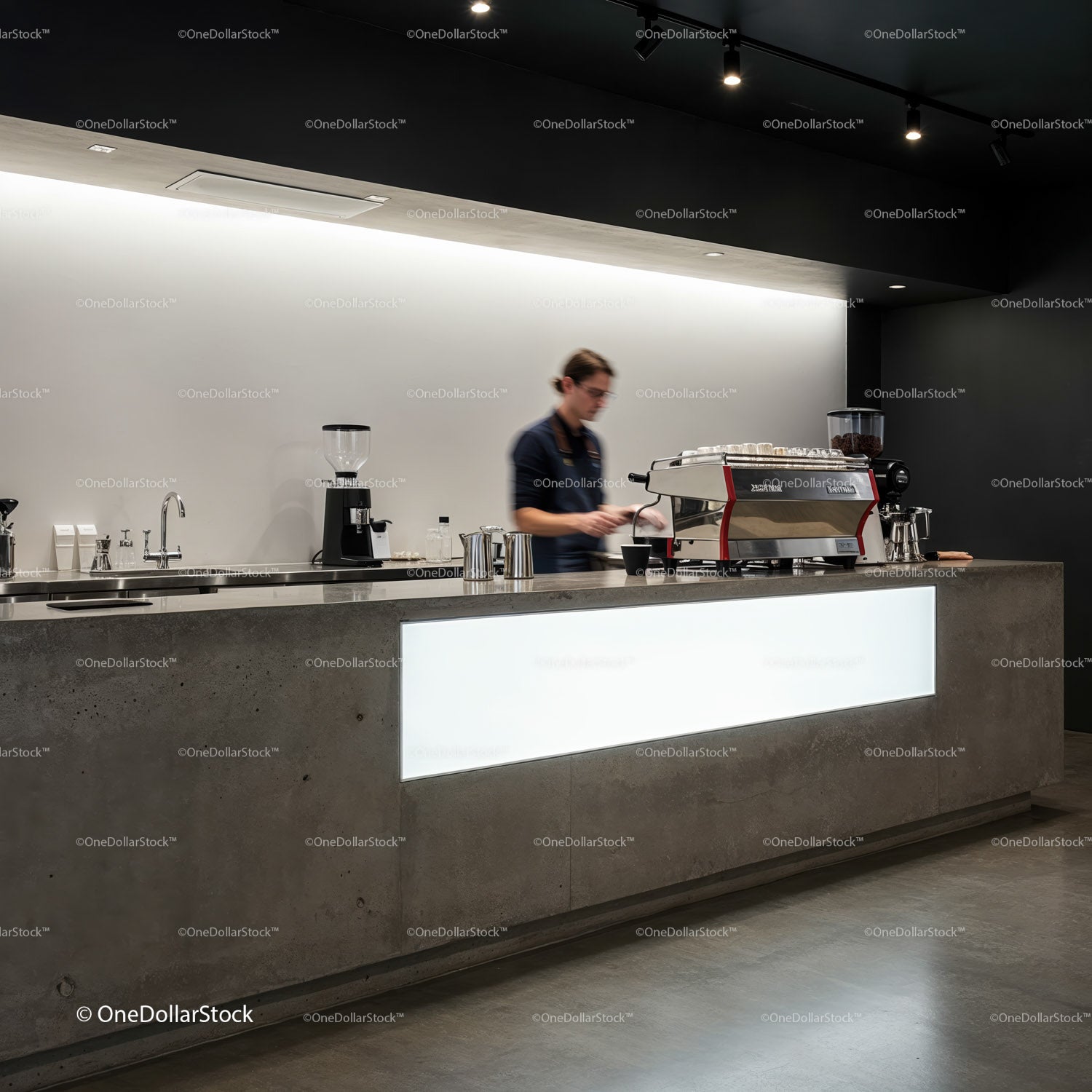 Barista preparing coffee in modern minimalist cafe interior