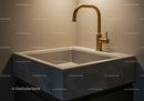 Elegant Concrete Sink with Gold Faucet in Contemporary Home Interior