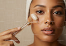 Close-up of Woman Using Facial Roller for Skincare Massage