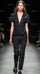 Elegant Black Blazer and Trousers Set on Fashion Runway Model