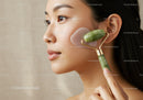 Close-up of an Asian Woman Using Jade Roller for Skin Care