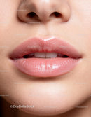 Close up of natural soft lips with subtle gloss
