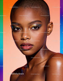 Close up portrait of confident woman with colorful makeup
