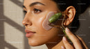 Young Woman Receiving Facial Massage with Jade Roller for Skin Rejuvenation