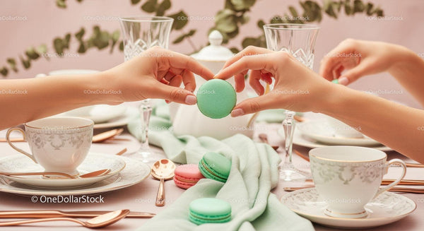 Elegant Pastel Tea Party with Macarons and Crystal Glasses