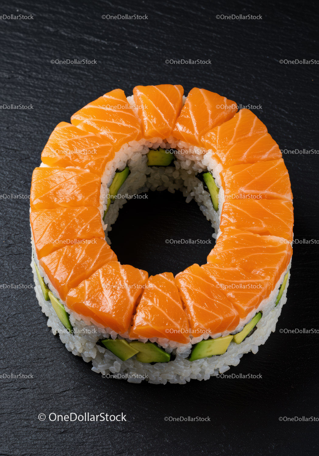 Fresh salmon sushi ring with avocado and rice