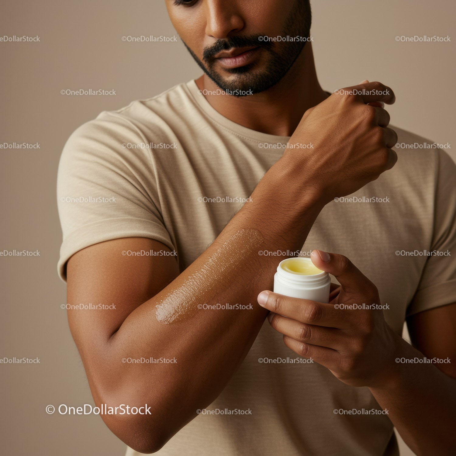 Man Applying Cream to Skin for Moisturizing and Skin Care Routine