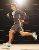 Athletic man running fast with motion blur effect