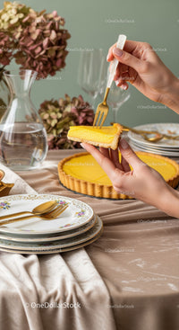 Elegant Table Setting with Sponge Cake and Fine China for Celebrations