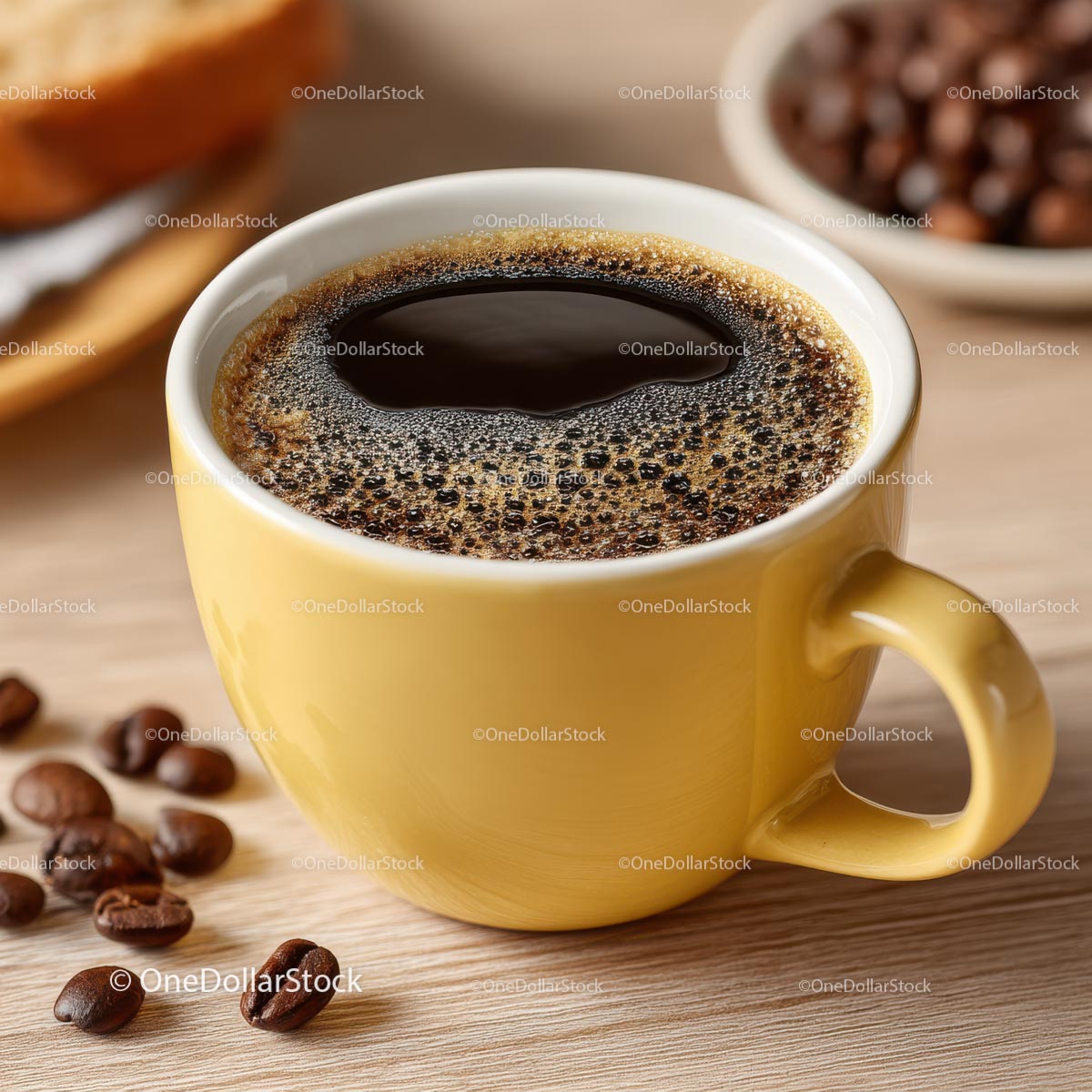 Delicious Black Coffee in Yellow Cup Surrounded by Coffee Beans