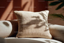 Beige Fabric Cushion on Sofa with Natural Light