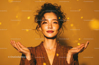 Joyful Woman in Gold Glitter with Sparkling Effect