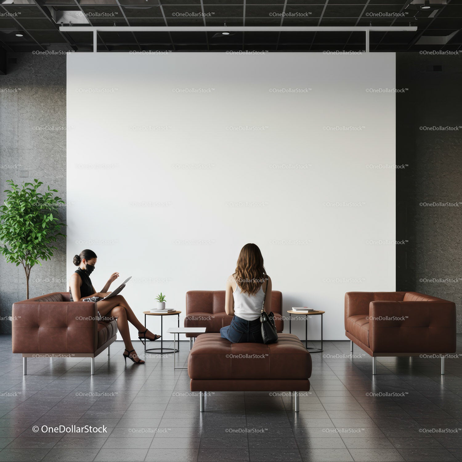 Two women sitting in modern lounge with brown sofas