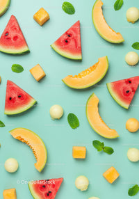 Fresh melon and watermelon slices with mint on blue