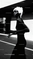 Portrait of woman with white hair in motion outdoors