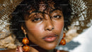 Elegant Woman Wearing Wide Brim Straw Hat with Summertime Style