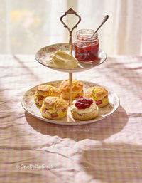 Homemade scones with fresh cream and strawberry jam