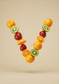 Fresh citrus and berries forming a vibrant flying V shape