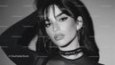 Stylish Young Woman with Elegant Makeup in Black and White Portrait