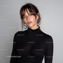 Elegant Woman in Black Turtleneck with Modern Urban Background
