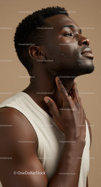 Elegant Black Man Portrait with Short Curly Hair and Deep Expression